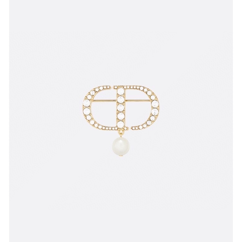 ch**an D*or brooches